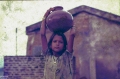 1.25-1984-katjuraho-19-girl-with-water0001